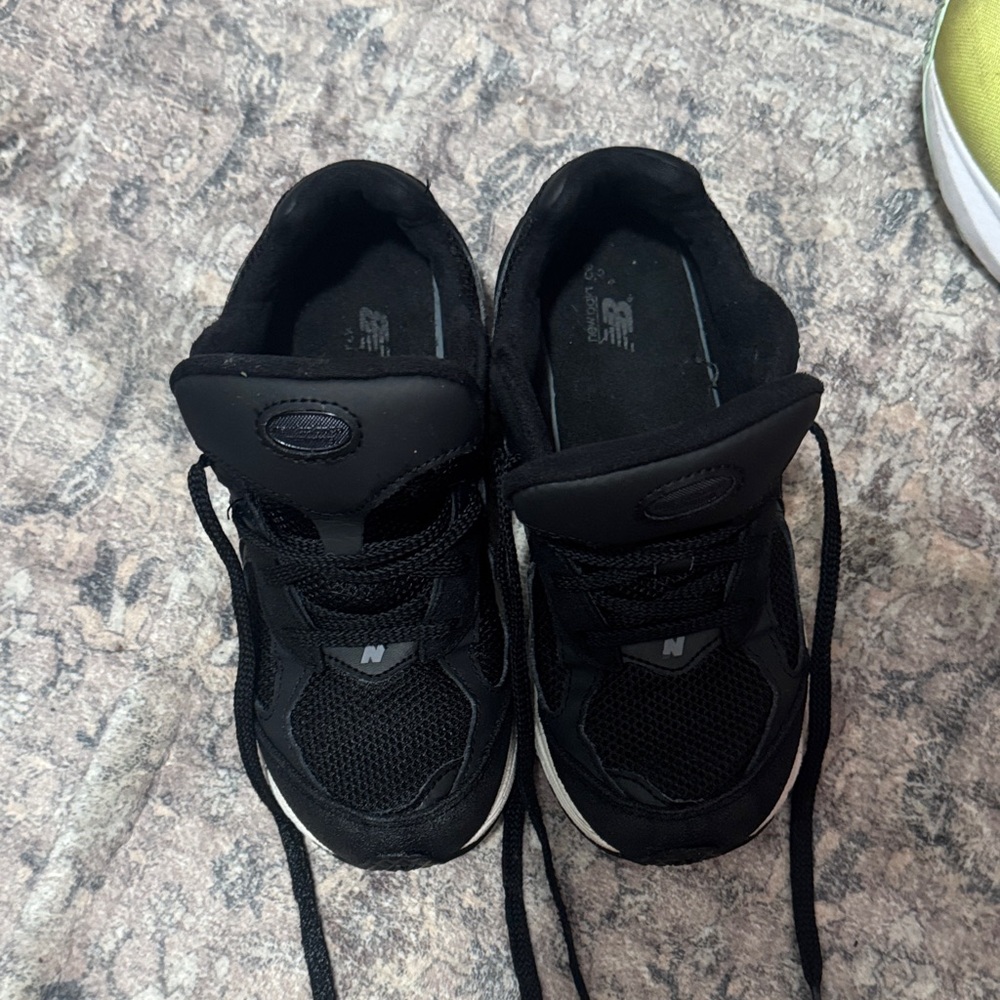 New Balance Black Sneakers with White Accents